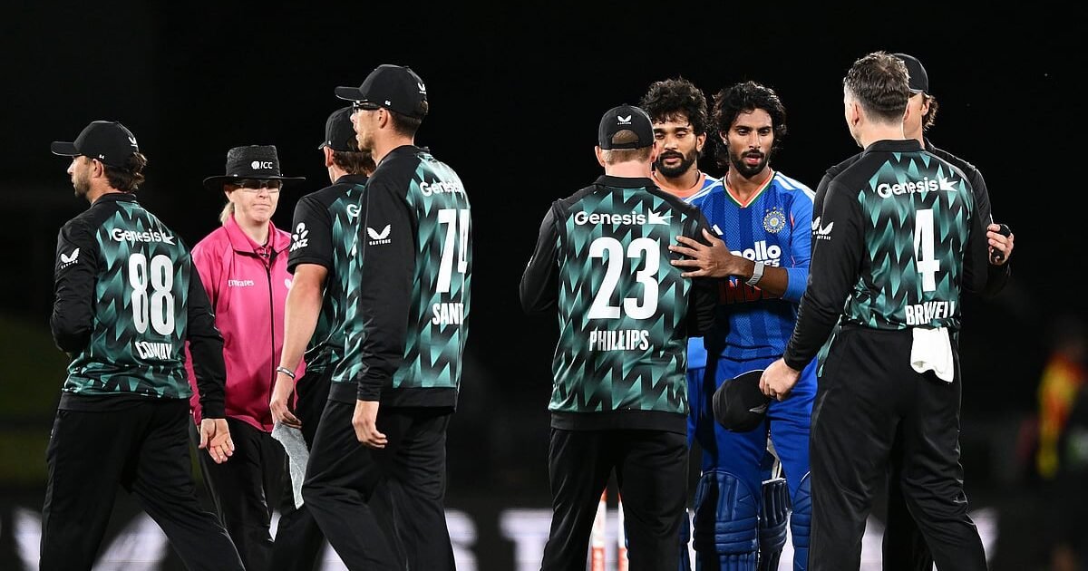 New Zealand players, including Glenn Phillips and Devon Conway, greet Tilak Varma after the second T20I between New Zealand and India in Christchurch