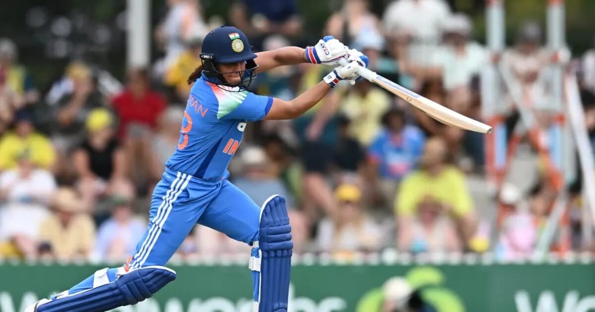 Harmanpreet Kaur playing a shot for India Women in the blue ODI kit