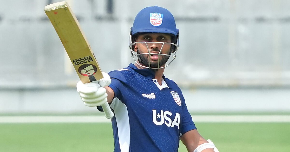 USA batter celebrates his century