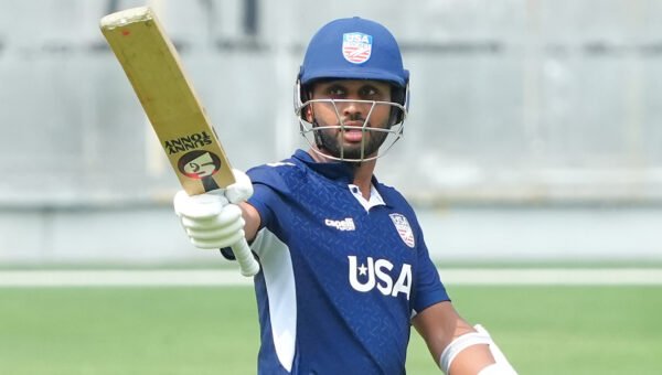 USA batter celebrates his century